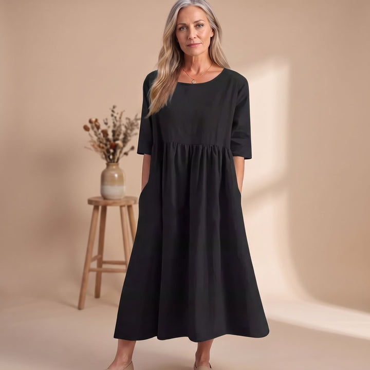Damen A-Linien Midi-Kleid mit 3/4-Arm und Taschen - Schwarz