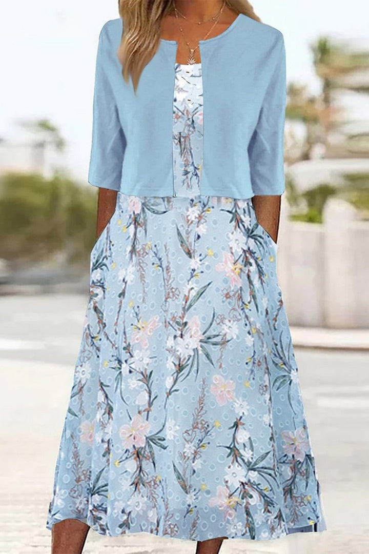 Damen Blumen Midi Kleid mit Rundhals Halbarm und Seitentaschen - Hellblau