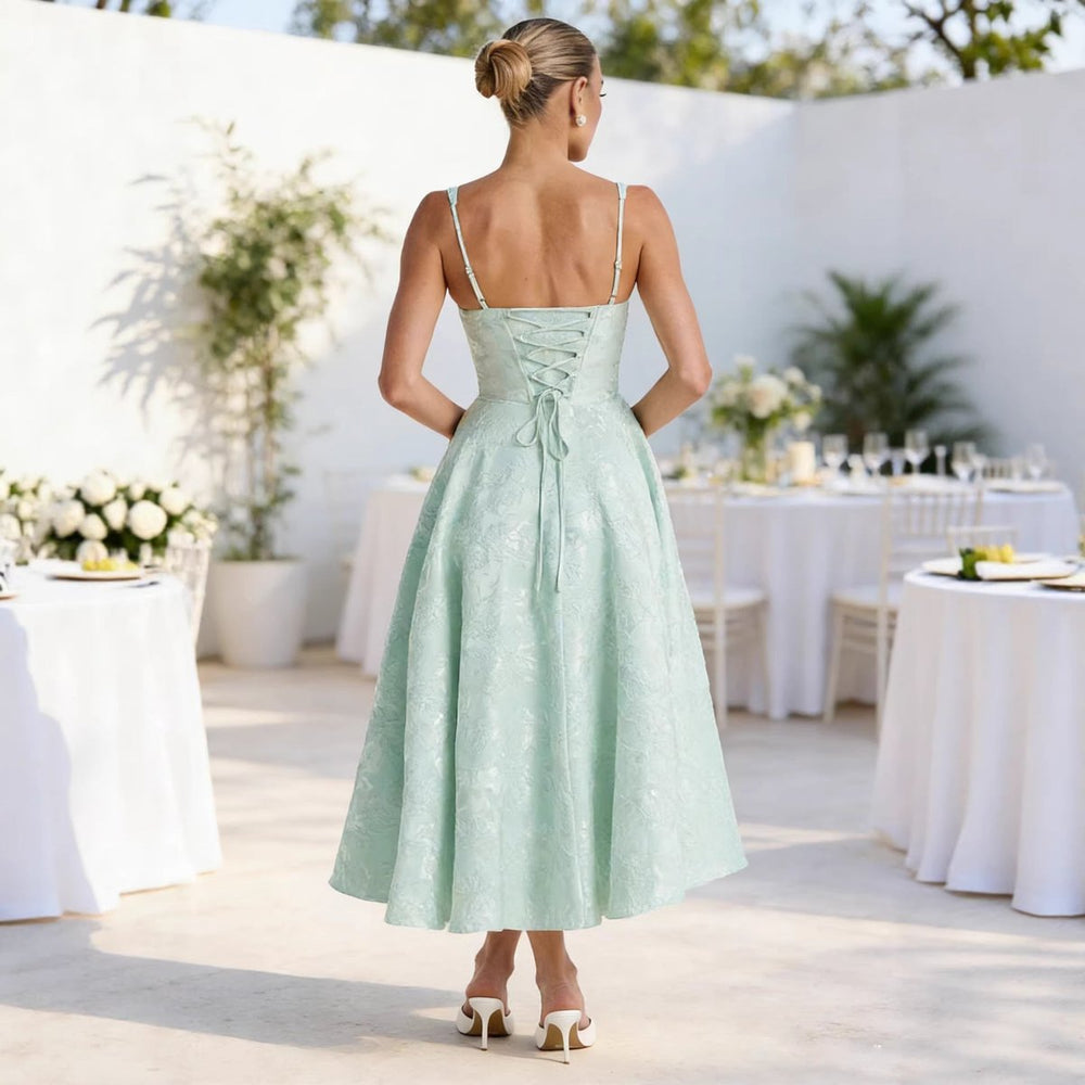 Damen Cocktailkleid mit Rüschenoberteil ausgestelltem Jacquard-Rock