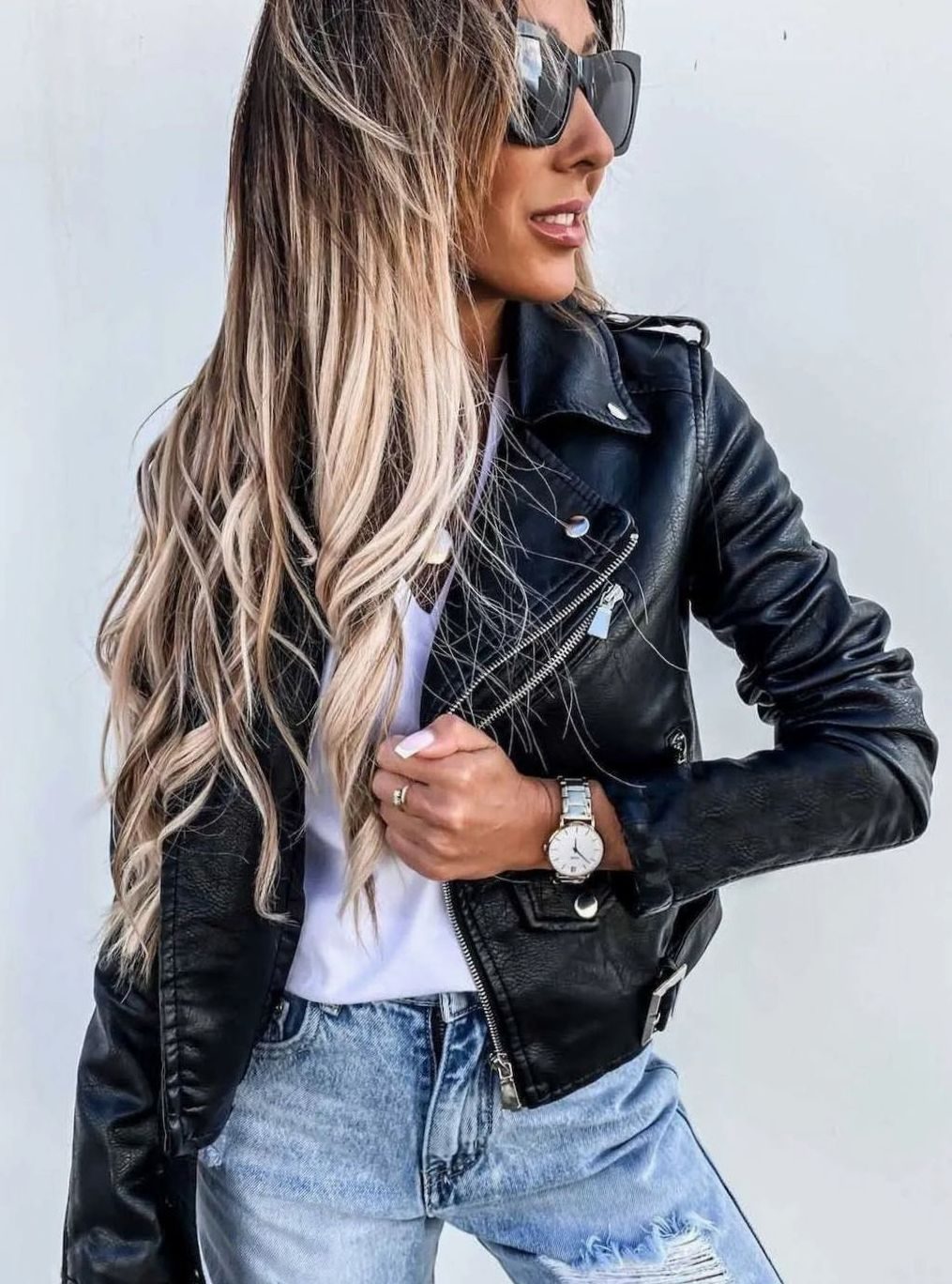 Damen Kunstleder-Bikerjacke mit Schrägzipper und Gürtel