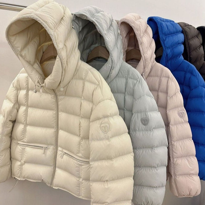 Damen Kurze Thermo-Steppjacke mit Kapuze und Reißverschlusstaschen