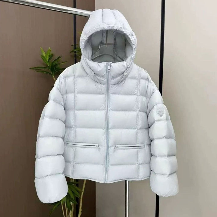 Damen Kurze Thermo-Steppjacke mit Kapuze und Reißverschlusstaschen - Blau