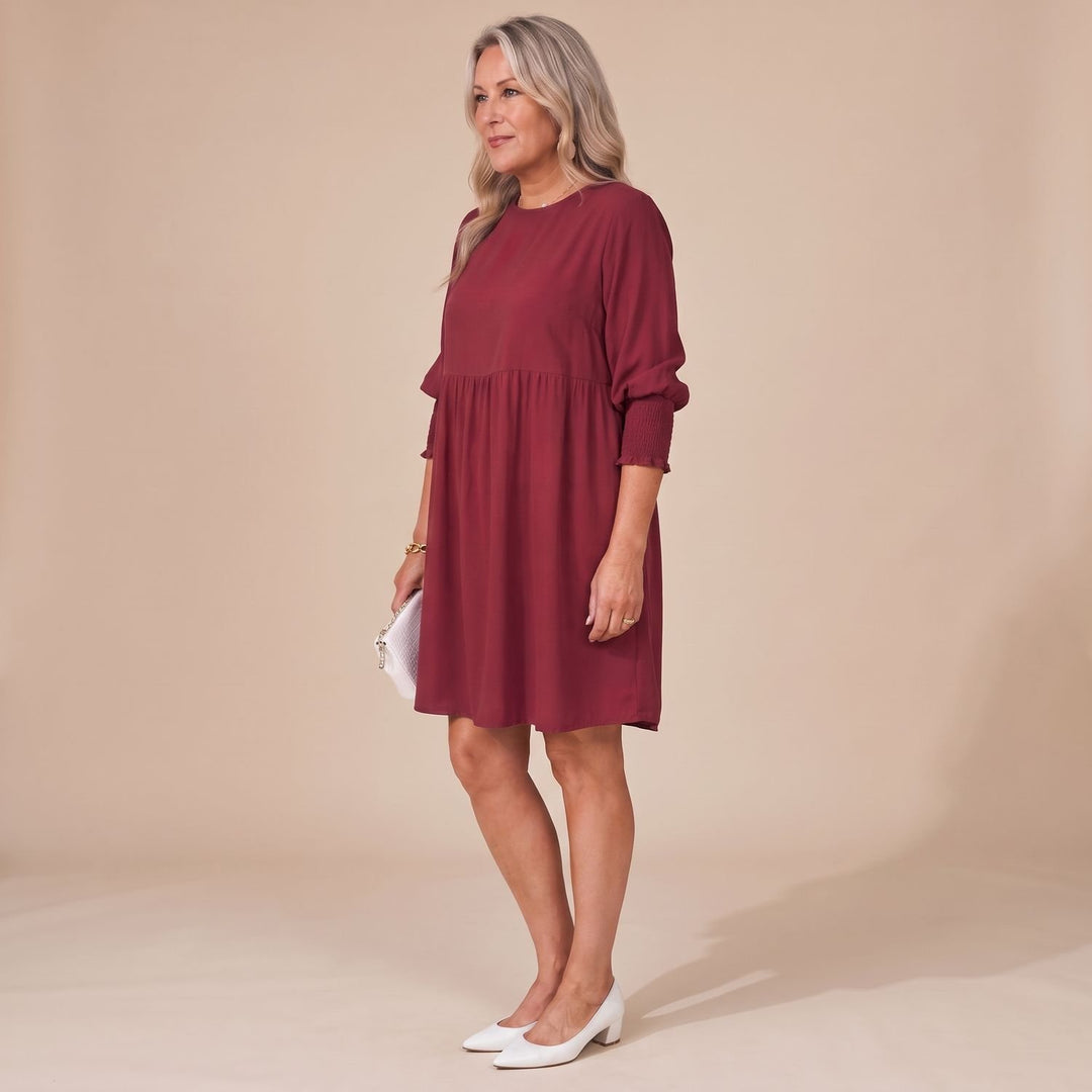 Damen Langarm-Kleid mit Smok-Manschetten lockerer Babydoll-Schnitt