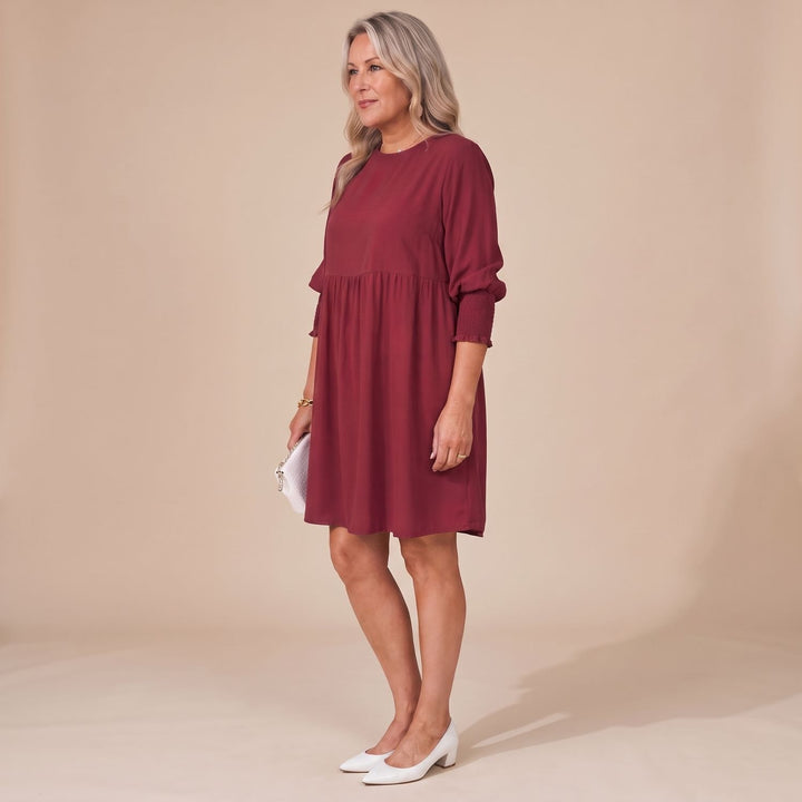 Damen Langarm-Kleid mit Smok-Manschetten lockerer Babydoll-Schnitt