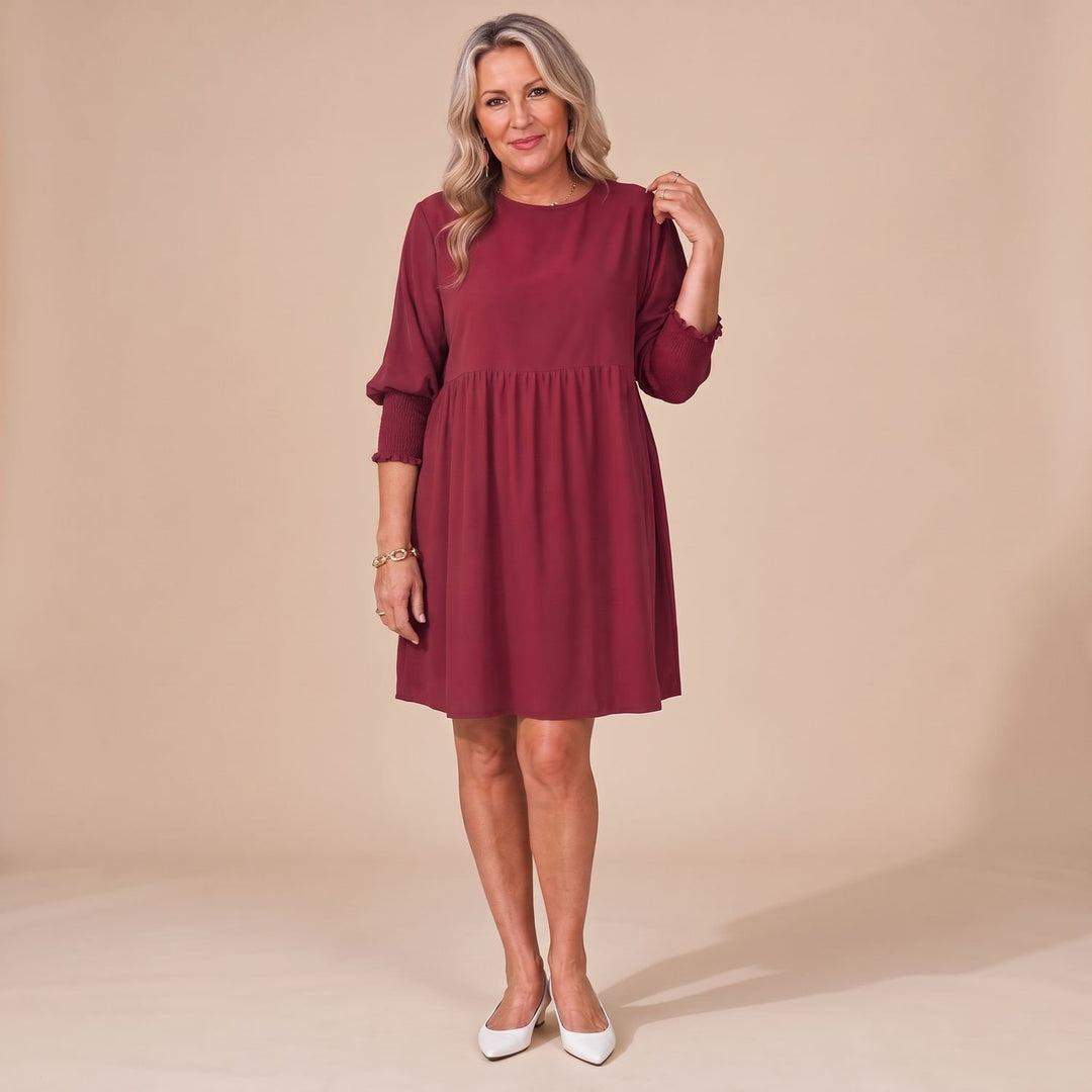 Damen Langarm-Kleid mit Smok-Manschetten lockerer Babydoll-Schnitt