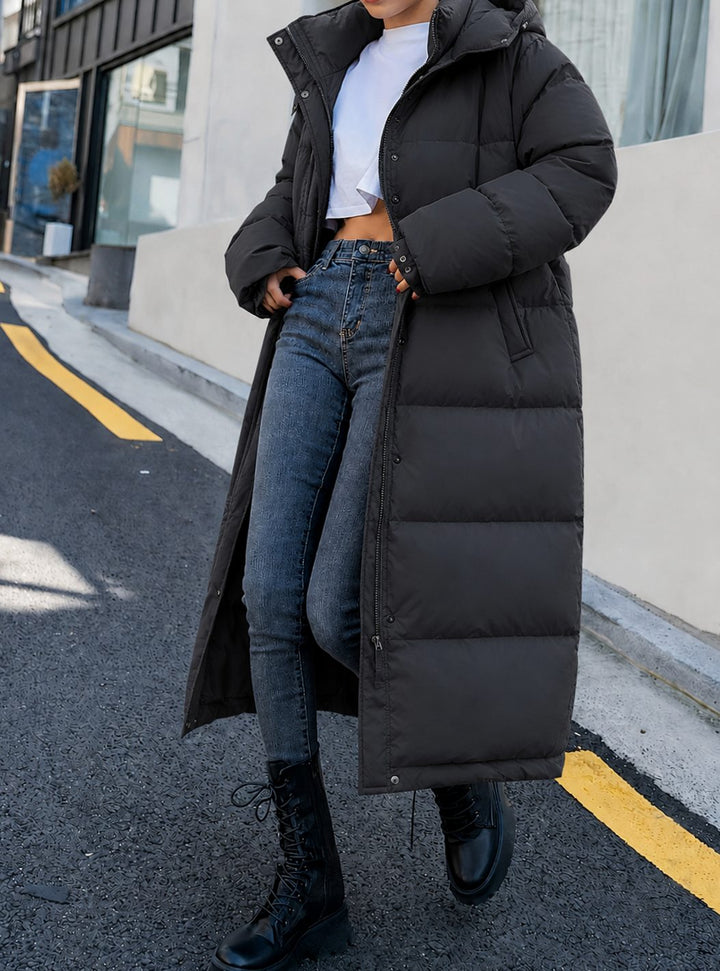 Damen Lange Gesteppte Winterjacke mit Kapuze