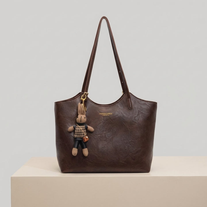 Damen Veganleder Tote Bag Schultertasche mit Plüsch-Anhänger
