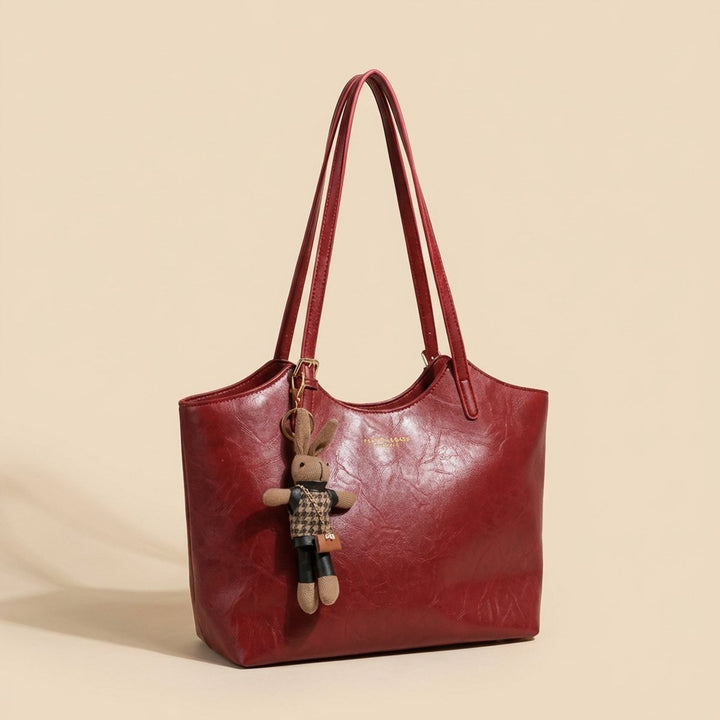 Damen Veganleder Tote Bag Schultertasche mit Plüsch-Anhänger