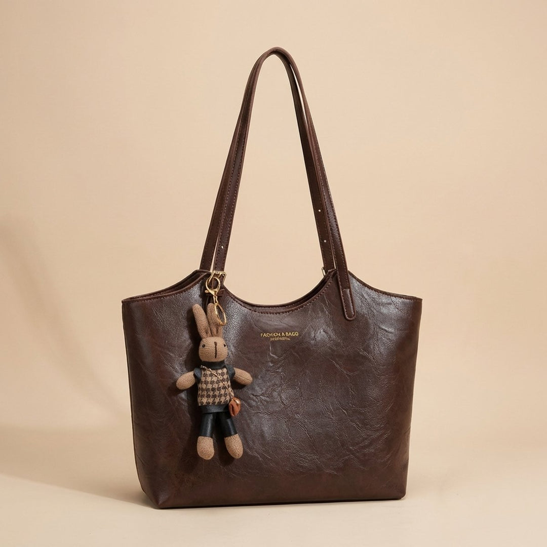 Damen Veganleder Tote Bag Schultertasche mit Plüsch-Anhänger