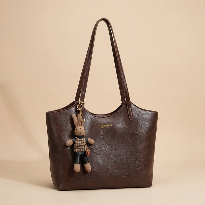 Damen Veganleder Tote Bag Schultertasche mit Plüsch-Anhänger