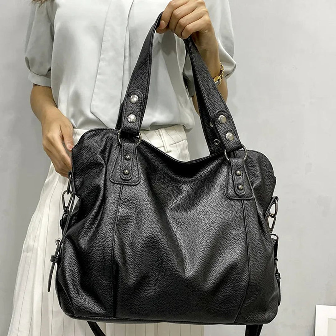 Geräumige schwarze Leder Tote bag mit Nietendetails - Creme
