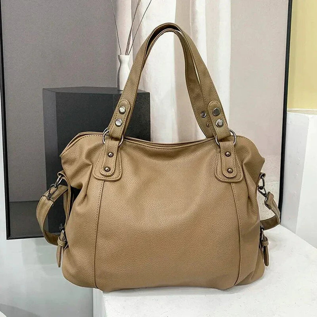 Geräumige schwarze Leder Tote bag mit Nietendetails - Beige